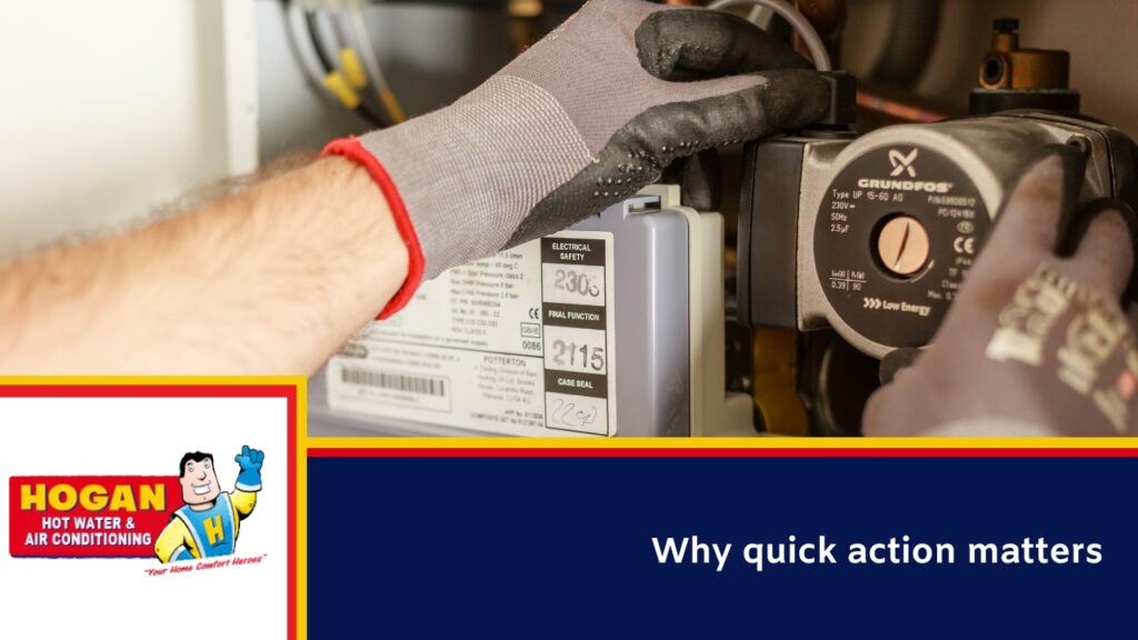 Signs your solar water heater requires urgent repairs » Solar Hot Water A technician wearing work gloves servicing a complex electrical solar hot water tank.