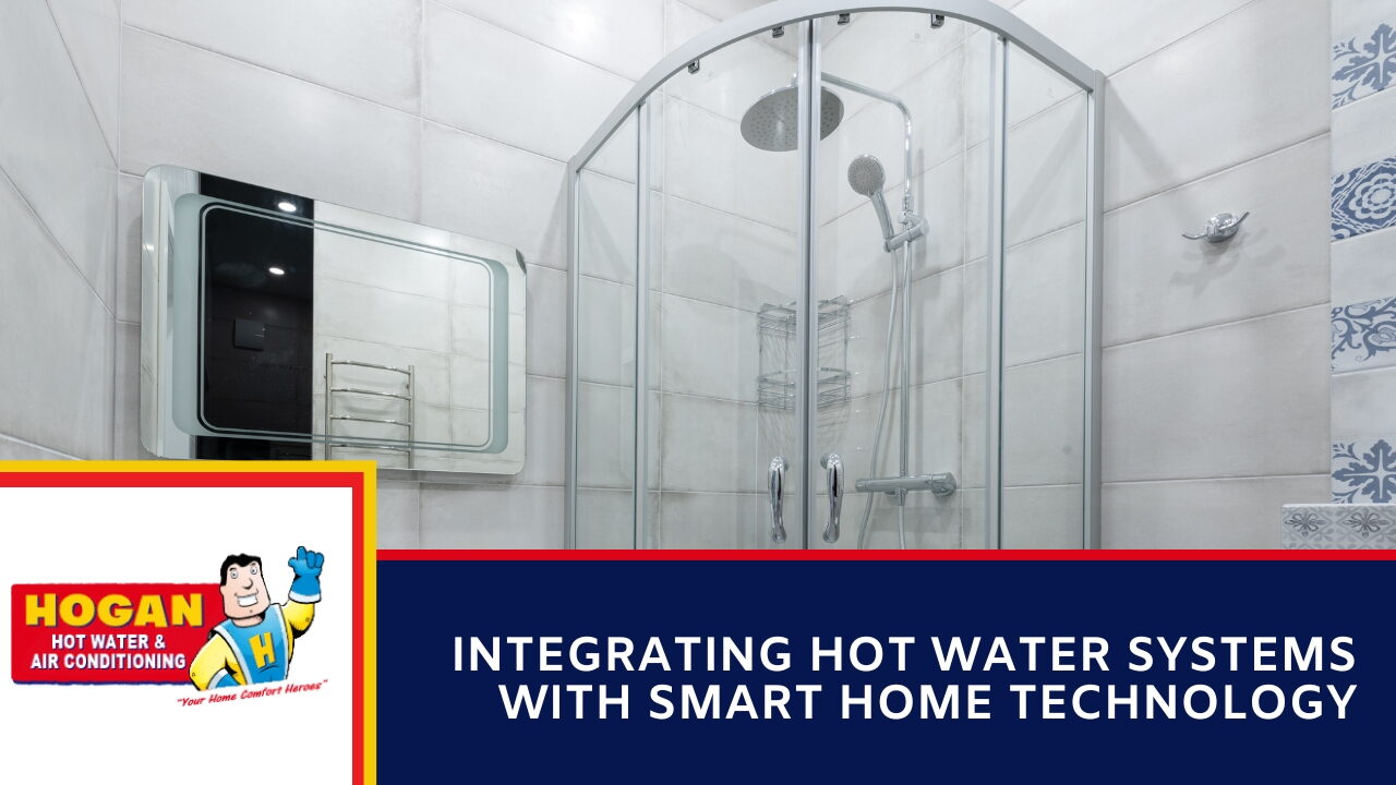 A modern tiled bathroom featuring a glass shower enclosure