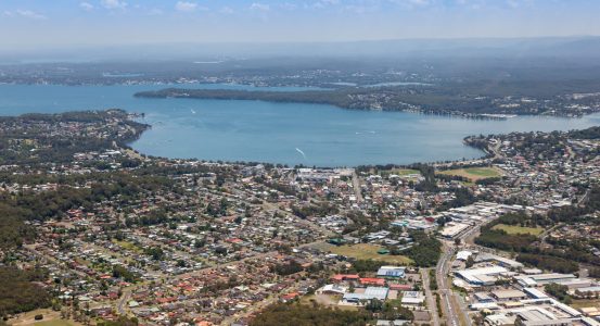 Hot Water Coal Point An expansive aerial view of a coastal town