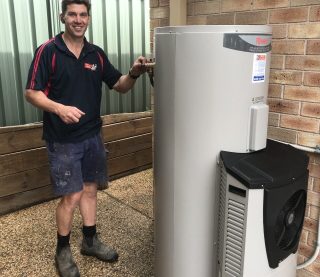Mike with Rheem heat pump hot water system Mike with Rheem heat pump hot water system