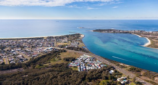 Aerial view of Blacksmiths Beach and Swansea Channel at the mouth of Lake Macquarie - Australia's largest salt water lake