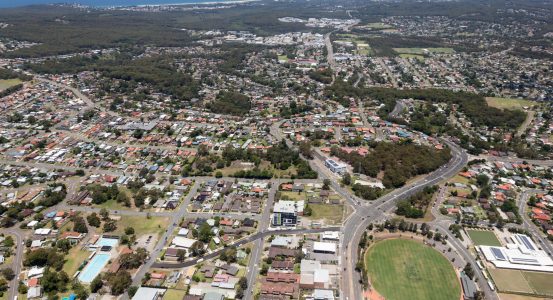 Aerial view of residential areas of Newcastle and Lake Macquarie. Charlestown Whitebridge and Gateshead surburbs looking south towards Readhead Beach and Lake Macquarie.